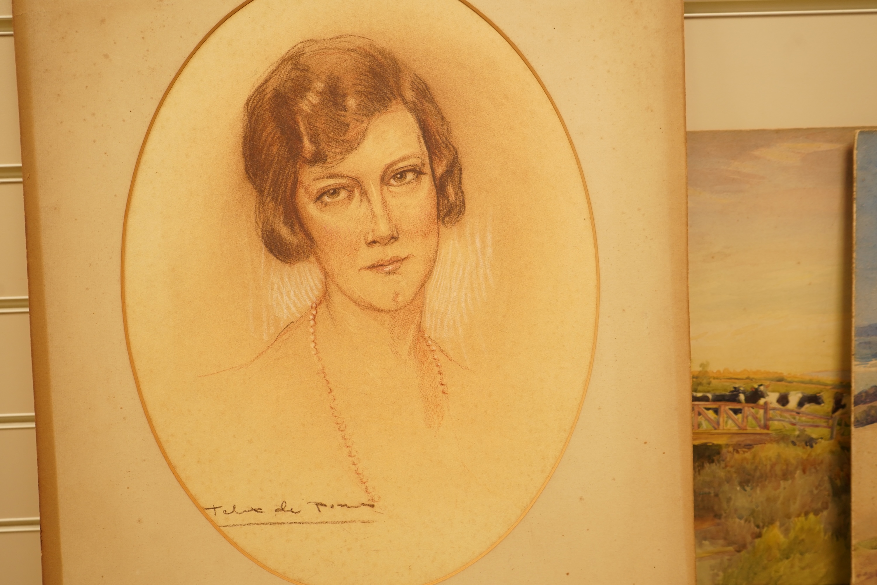 John William Schofield (1865-1944), a collection of six watercolours and pastels to include landscape with castle beyond, coastal views and street scene with cottages, most signed, together with an oval pastel portrait o